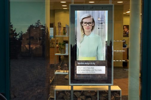 New frames were attached to existing light boxes to tie them in with the window scheme