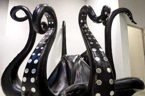 The octopus sculpture was hand-carved from polystyrene and sprayed in high-gloss black resin