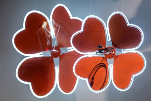 Close-up of perspex hearts hanging within the window, designed by Prop Studios