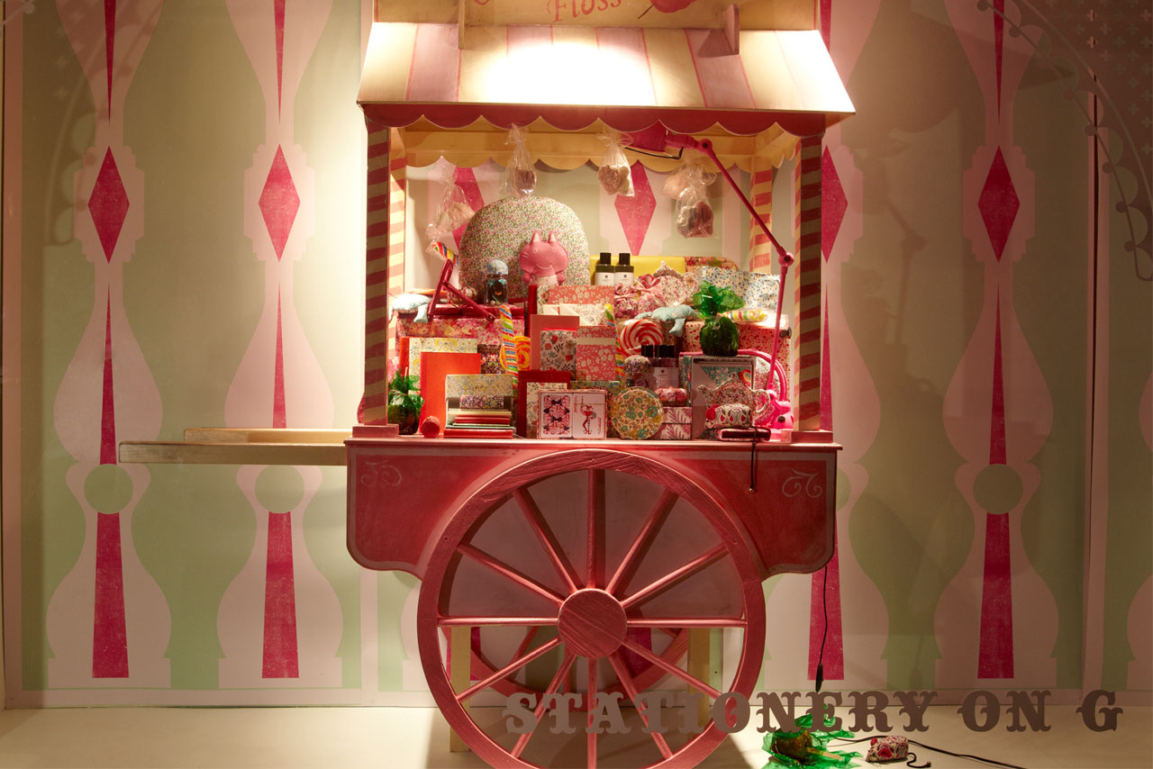 Close-up shot of Prop Studios' custom-designed candyfloss cart for the Liberty fairground window scheme